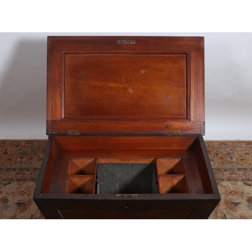 215 - A 19TH CENTURY MAHOGANY CETTARETT OF SARCOPHAGUS OUTLINE the hinged lid with compartments above a pa... 