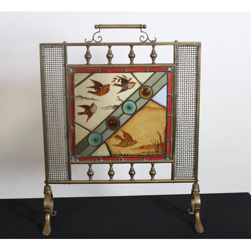 216 - A 19TH CENTURY BRASS LEAD GLASS AND POLYCHROME FIRESCREEN of rectangular form with carrying handle t... 