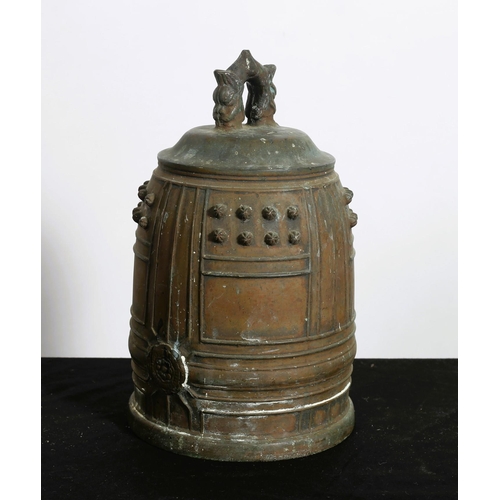 231 - A CHINESE BRONZE CLAPPERLESS BELL of dome form with figural scroll handle 
30cm (h)