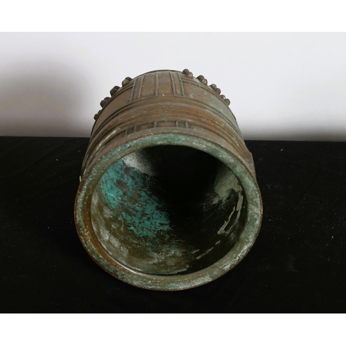 231 - A CHINESE BRONZE CLAPPERLESS BELL of dome form with figural scroll handle 
30cm (h)