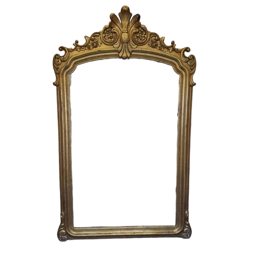 235 - A CONTINENTAL GILTWOOD AND GESSO MIRROR the rectangular arched plate within a beadwork moulded frame... 