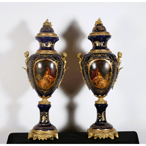 237 - A FINE AND IMPRESSIVE PAIR OF CONTINENTAL SEVRES STYLE PORCELAIN AND BRASS LIDDED VASES each of ovoi... 