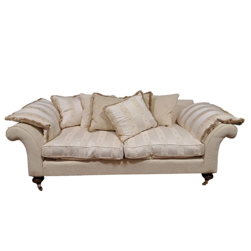 277 - A GOOD DESIGNER UPHOLSTERED THREE PIECE SUITE comprising a three seater settee the rectangular back ... 