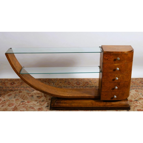 290 - AN ART DECO WALNUT AND GLAZED CONSOLE TABLE of rectangular bowed outline the shaped top with two gla... 