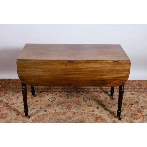 295 - A 19TH CENTURY MAHOGANY DROP LEAF TABLE the rectangular hinged top above a moulded apron on ring tur... 