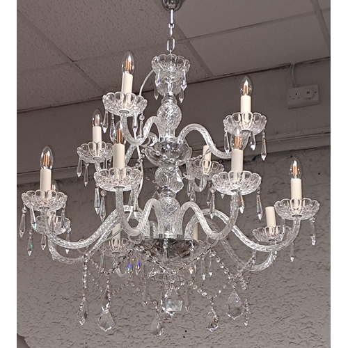 340 - A CONTINENTAL CUT GLASS TEN BRANCH CHANDELIER in two registers the baluster column issuing spiral tw... 