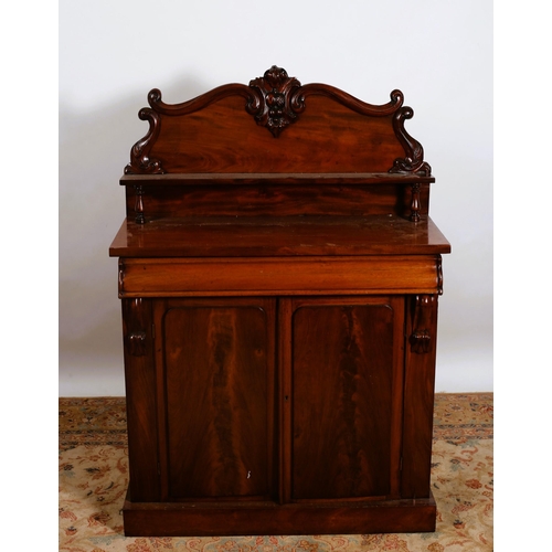 365 - A 19TH CENTURY MAHOGANY SIDE CABINET of rectangular outline the superstructure with carved and mould... 