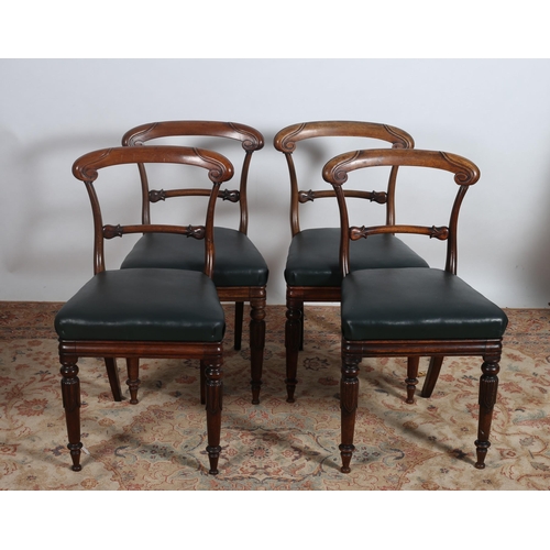 377 - A SET OF FOUR WILLIAM IV MAHOGANY DINING CHAIRS each with a shaped scroll top rail and splat with hi... 