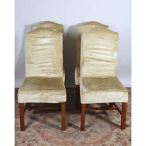 379 - A SET OF FOUR STAINED WOOD AND UPHOLSTERED DINING CHAIRS each with a rectangular arched back with up... 