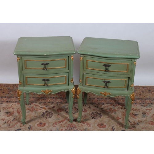 397 - A PAIR OF CONTINENTAL GREEN PAINTED AND PARCEL GILT PEDESTALS each of serpentine outline the shaped ... 