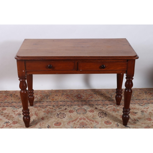 404 - A 19TH CENTURY MAHOGANY SIDE TABLE of rectangular outline the shaped top with two frieze drawers on ... 