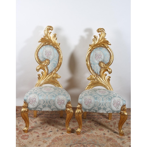 406 - A PAIR OF CONTINENTAL GILTWOOD AND UPHOLSTERED SIDE CHAIRS each with a foliate and upholstered carve... 