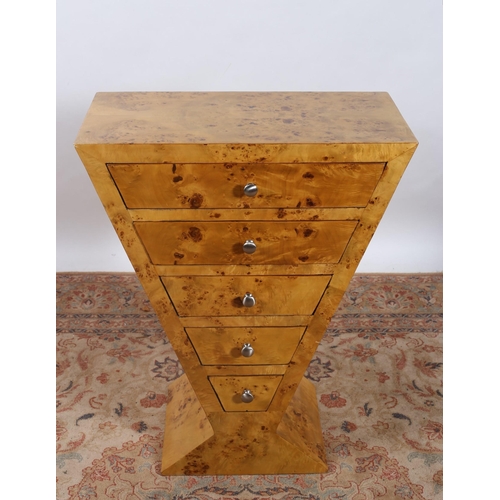 407 - AN ART DECO DESIGN BURR WALNUT CHEST of rectangular tapering form the shaped top above five tapering... 