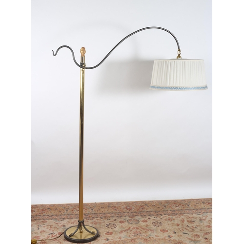 415 - A GILT BRASS AND STEEL FLOOR STANDARD LAMP the cylindrical column issuing a scroll arm with pleated ... 