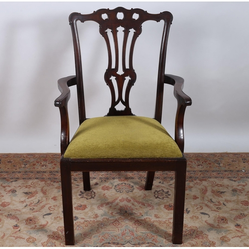 425 - A CHIPPENDALE DESIGN MAHOGANY ELBOW CHAIR the serpentine top rail above a pierced vertical splat wit... 