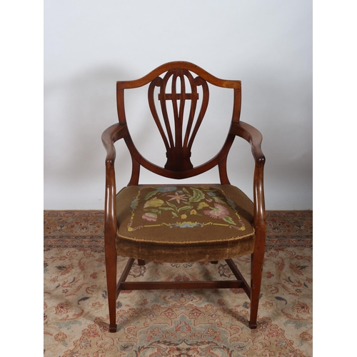 428 - A 19TH CENTURY MAHOGANY HEPPLEWHITE DESIGN ARMCHAIR the shield shaped back with pierced vertical spl... 