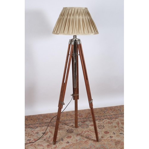 429 - A CONTEMPORARY HARDWOOD WHITE METAL FLOOR STANDARD LAMP in the form of a telescopic tripod with plea... 