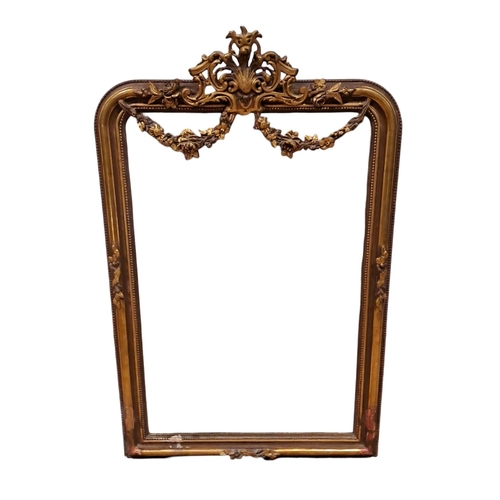 456 - A CONTINENTAL GILT FRAME MIRROR the rectangular bevelled glass plate within a moulded frame with bea... 