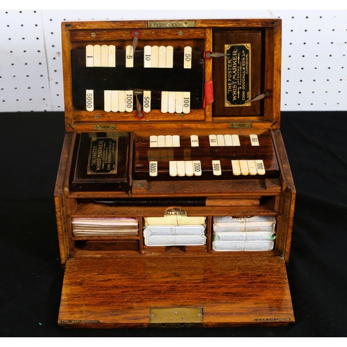 496 - A 19TH CENTURY OAK CASED GAMING BOX BY FOSTER containing whist markers and cards 
13cm (h) x 24cm (w... 