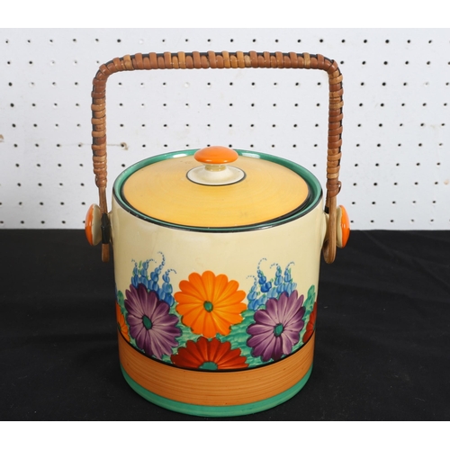 525 - A CLARICE CLIFF BISCUIT BARREL of cylindrical form painted overall with sunflowers 
21cm (h)