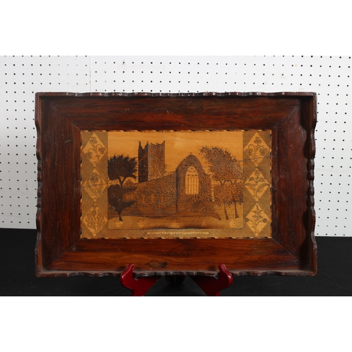 539 - A KILLARNEY WARE GALLERY TRAY inlaid with yew wood and arbutus wood depicting an abbey
29cm (h) x 45... 