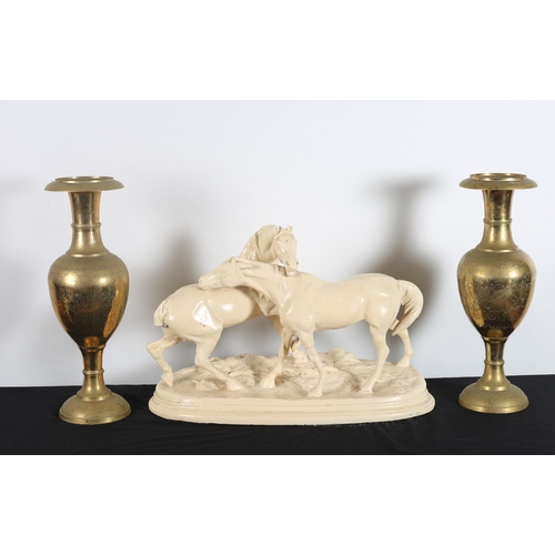 589 - A VINTAGE GROUP modelled as two stallions shown fighting on a naturalistic base together with A PAIR... 