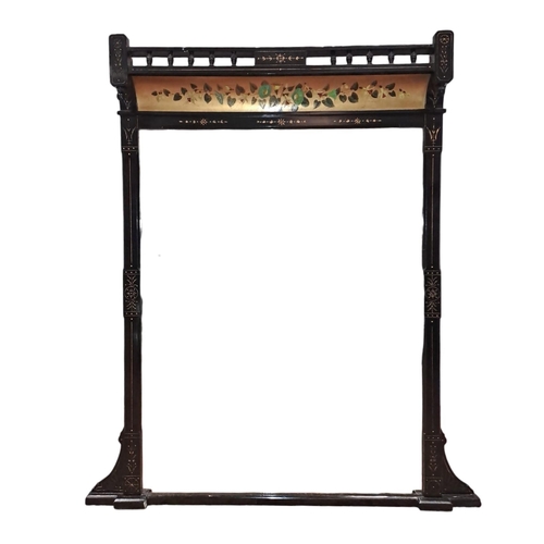 684 - A 19TH CENTURY EBONISED PARCEL GILT AND POLYCHROME OVERMANTEL MIRROR the rectangular plate within a ... 