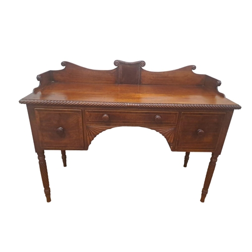 69 - A 19TH CENTURY MAHOGANY SIDEBOARD of rectangular outline the moulded three quarter gallery with gadr... 