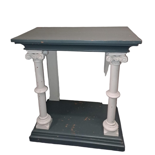 756 - A GOTHIC DESIGN PAINTED CONSOLE TABLE of rectangular form the shaped top raised on cylindrical colum... 