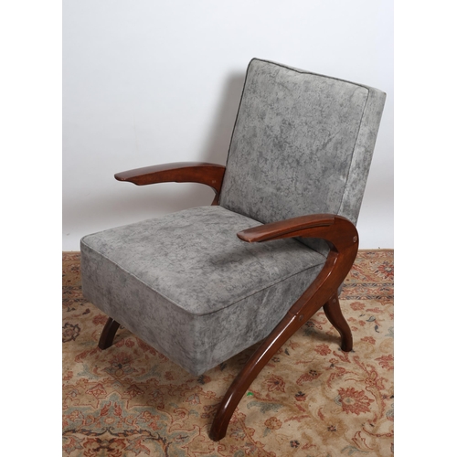 76 - A VINTAGE STAINED WOOD AND UPHOLSTERED ARMCHAIR the rectangular upholstered back and seat on shaped ... 