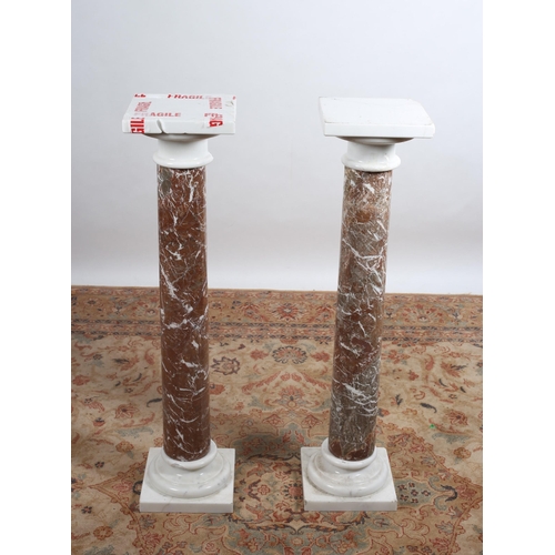 94 - A PAIR OF CONTINENTAL MARBLE PEDESTALS each with a square revolving top above a cylindrical column o... 