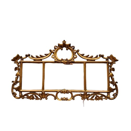 326 - A CONTINENTAL GILT FRAME COMPARTMENT MIRROR the rectangular bevelled glass plates within a moulded f... 