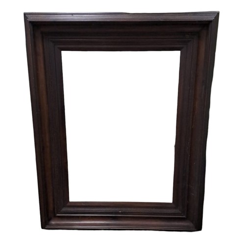 731 - A LARGE HARDWOOD STAINED FRAMED MIRROR with bevelled glass plate together with A WICKER WORK FRAMED ... 