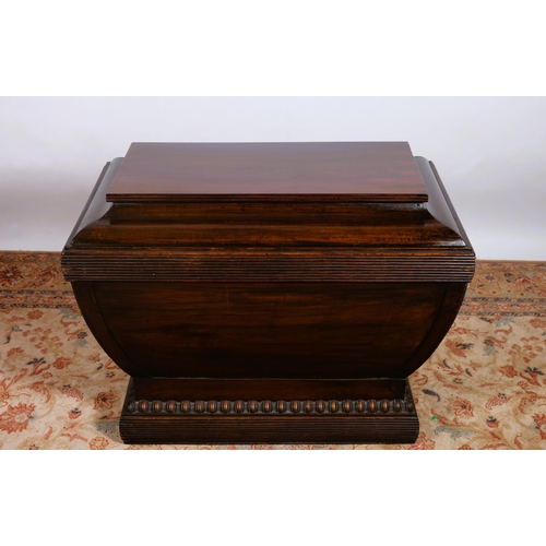 62 - A 19TH CENTURY MAHOGANY AND LATER CELLARETTE OF SARCOPHAGUS OUTLINE the hinged lid containing an eig... 