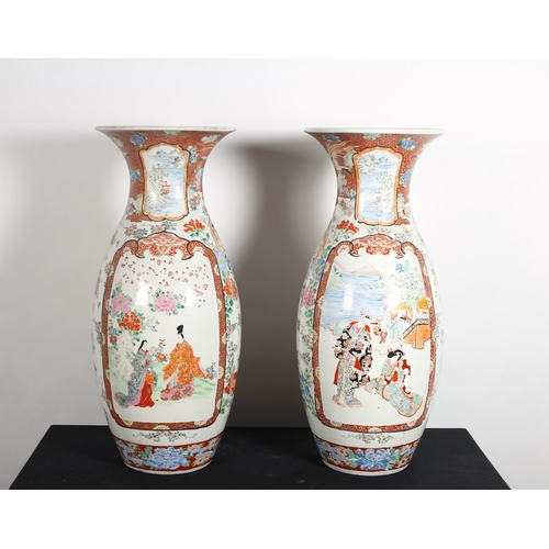 277 - A PAIR OF ORIENTAL VASES each of baluster form with flared rims the white ground with figural and fl... 