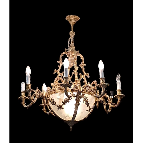 388 - A CONTINENTAL CUT GLASS AND FROSTED GLASS CHANDELIER the foliate cast circlet hung with ribbon tied ... 