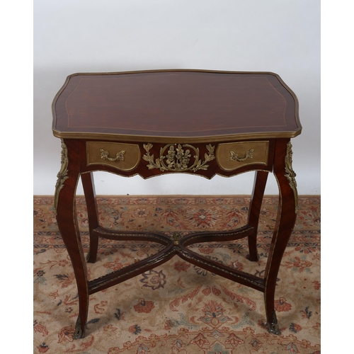 531 - A CONTINENTAL KINGWOOD AND GILT BRASS MOUNTED TABLE of serpentine outline the shaped top with frieze... 