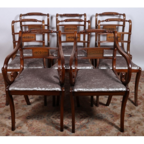 570 - A NINE PIECE MAHOGANY DINING ROOM SUITE comprising a set of eight Regency design mahogany dining cha... 