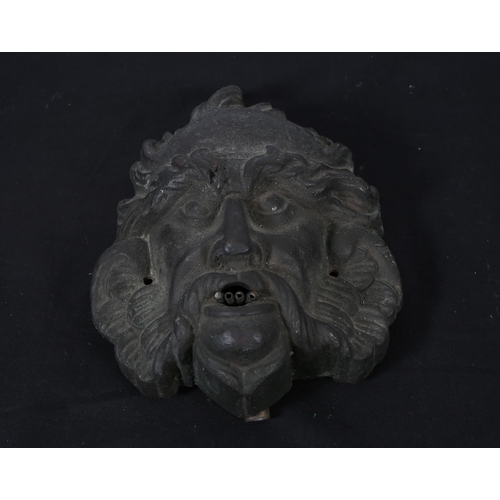 108 - A 19TH CENTURY CAST BRONZE WALL FOUNTAIN modelled as a gargoyle its mouth plumbed for water
26cm (h)... 