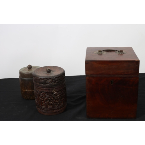 111 - A GEORGIAN MAHOGANY CADDY of rectangular outline the hinged lid with brass carrying handle
22cm (h) ... 