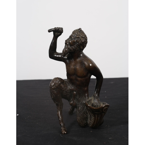 119 - A 19TH CENTURY BRONZE FIGURE modelled as a satyr shown kneeling 
18cm (h)