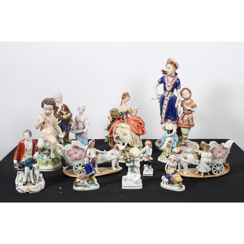 127 - A COLLECTION OF PORCELAIN FIGURES to include a Capodimonte group modelled as a young lady shown seat... 