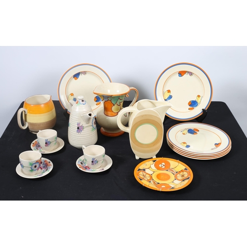 128 - A COLLECTION OF CLARICE CLIFF CHINA to include jugs, plates, coffee pot, etc. (18)