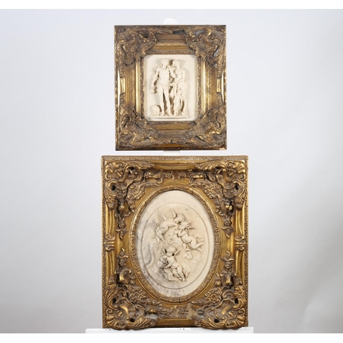 143 - TWO COMPOSITION PANELS ALLEGORICAL
SCENES moulded in high relief
In ornate gilt frames 
The larger 6... 