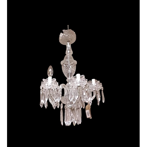 168 - A WATERFORD CUT GLASS FIVE BRANCH CHANDELIER hung with faceted pendants 
Drop 60cm