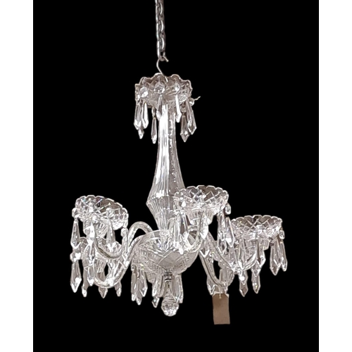 169 - A WATERFORD CUT GLASS SIX BRANCH CHANDELIER hung with faceted pendants 
Drop 60cm