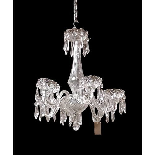 170 - A WATERFORD CUT GLASS SIX BRANCH CHANDELIER hung with faceted pendants 
Drop 60cm