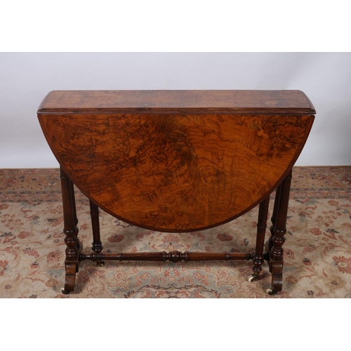 186 - A 19TH CENTURY BURR WALNUT SUTHERLAND TABLE of oval outline the shaped top raised on dual ring turne... 