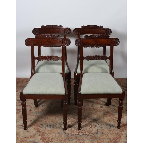 188 - A SET OF FOUR REGENCY MAHOGANY AND UPHOLSTERED DINING CHAIRS each with a tablet shaped splat with sh... 