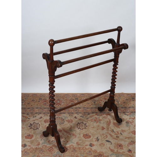 204 - A 19TH CENTURY MAHOGANY FIVE BAR TOWEL RAIL with spiral twist supports on splayed legs with scroll t... 